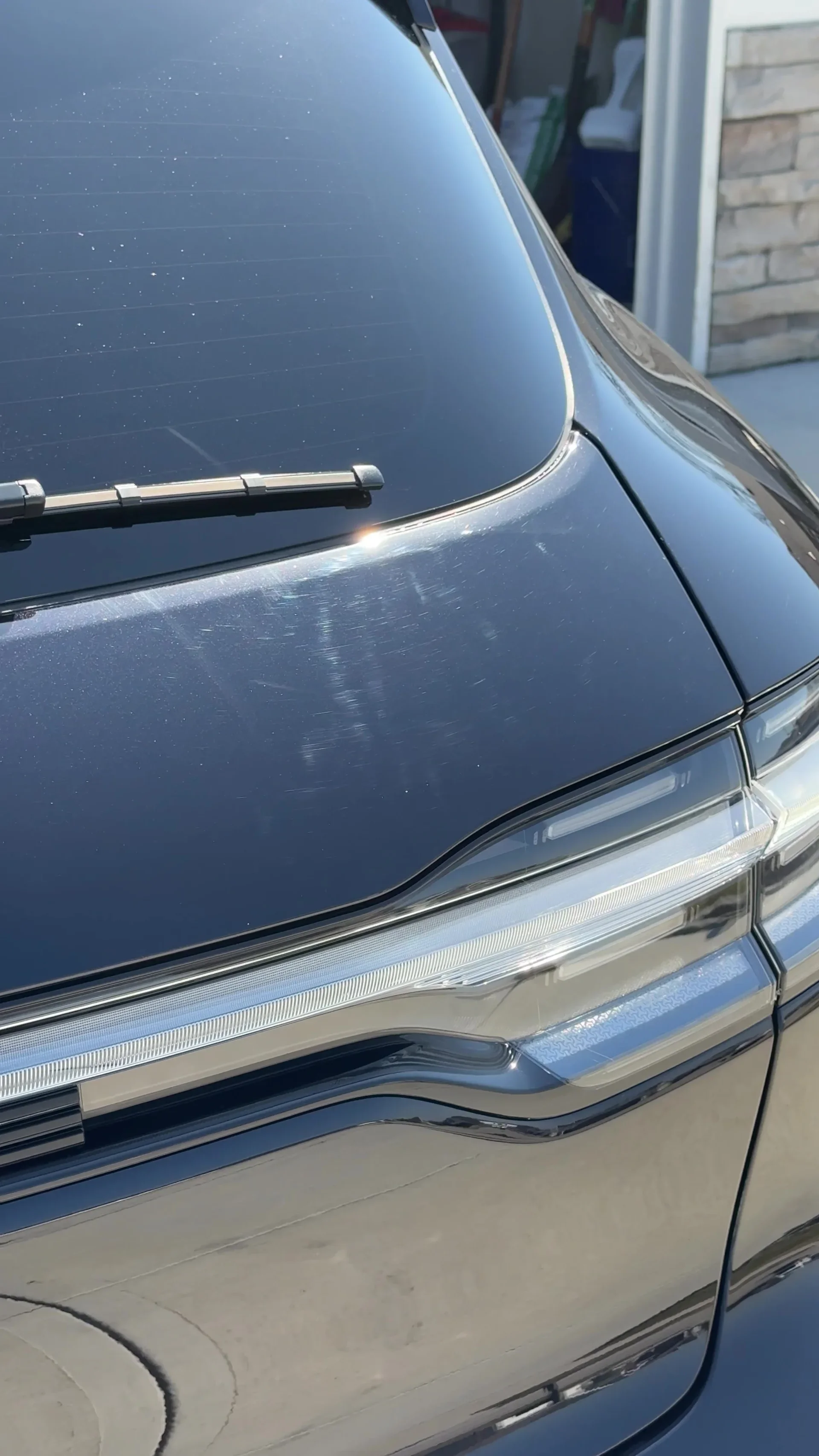 Water spots and mineral etching on hood
