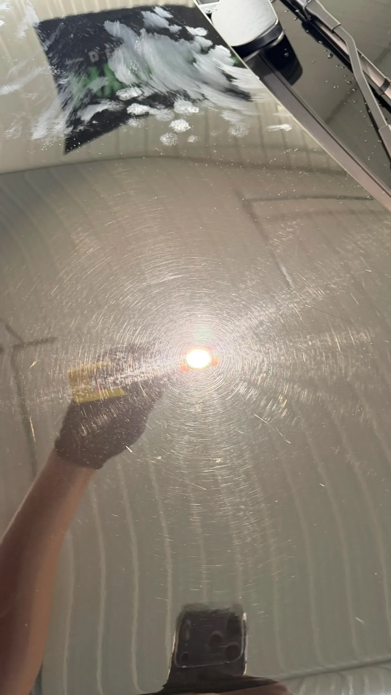 Swirl marks under inspection light - Kansas City paint correction